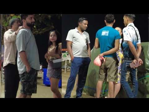 Beach Road Pattaya. Indian guys are talking to Thai women. Thailand 2025 January 1