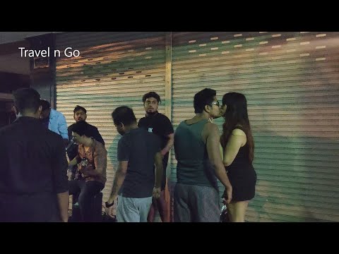 Indian Man Kiss Thai Lady At Walking Street Pattaya. Bars Closing Time, Girls Going Back to Home.